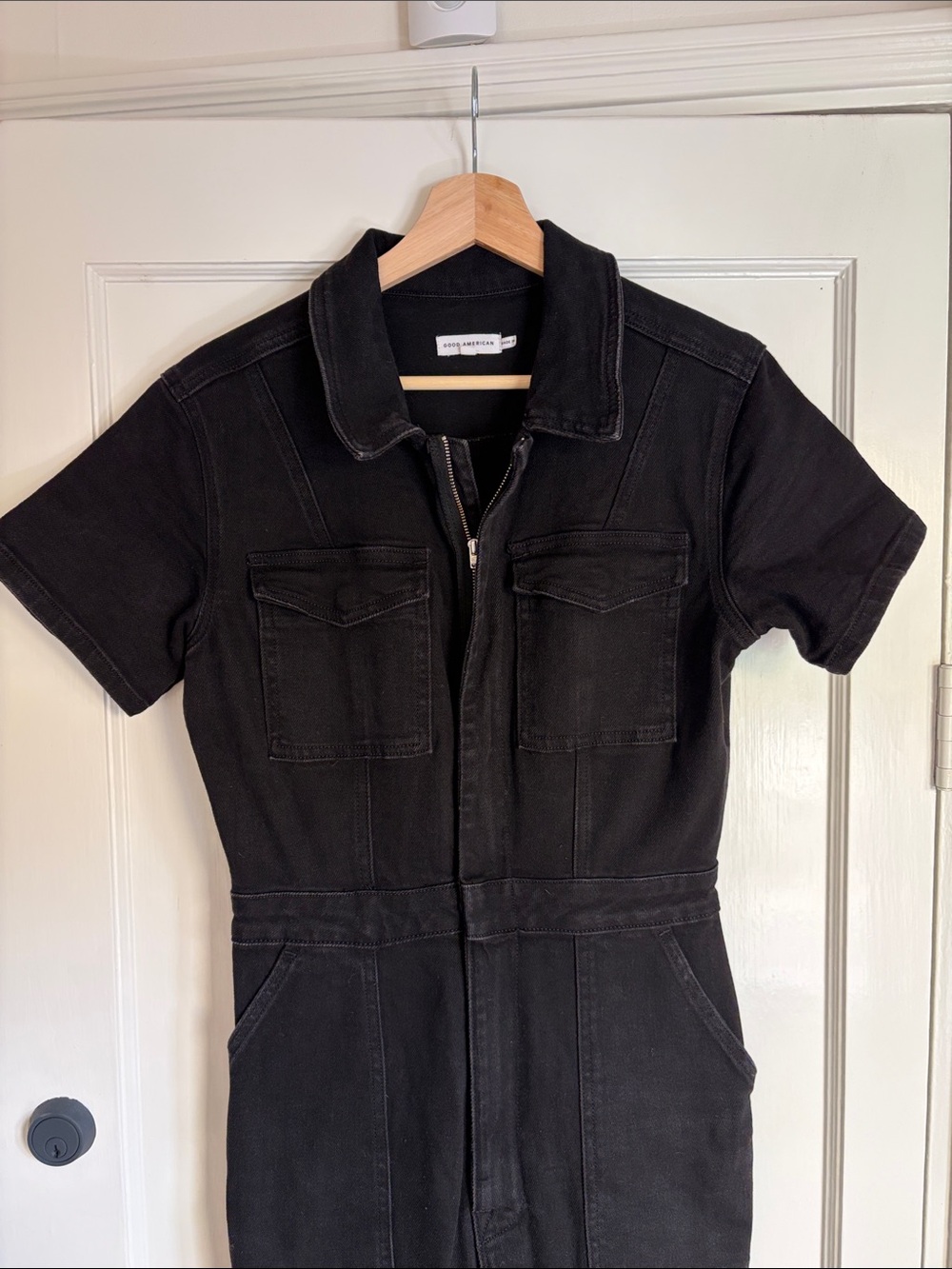 Good American “Fit For Success” Black Zip-Front Short Sleeve Jumpsuit